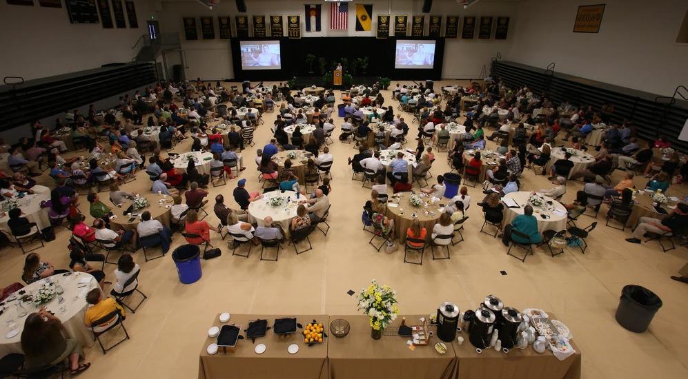 Staff attending Fall Conference in El Pomar Center main gym.